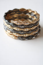 Gold & Black Metal Coil Expandable Stack Bracelet