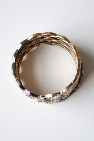 Gold & Black Metal Coil Expandable Stack Bracelet