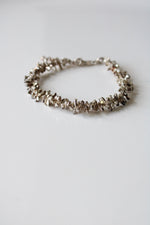 Sterling Silver Beaded Puka Shell Look Bracelet