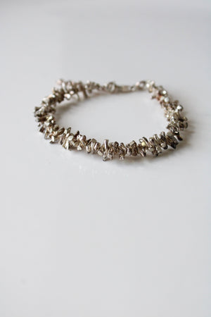 Sterling Silver Beaded Puka Shell Look Bracelet