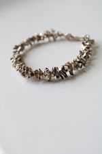 Sterling Silver Beaded Puka Shell Look Bracelet