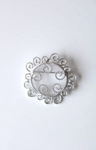 Sarah Coventry Silver Swirl Circular Brooch Pin