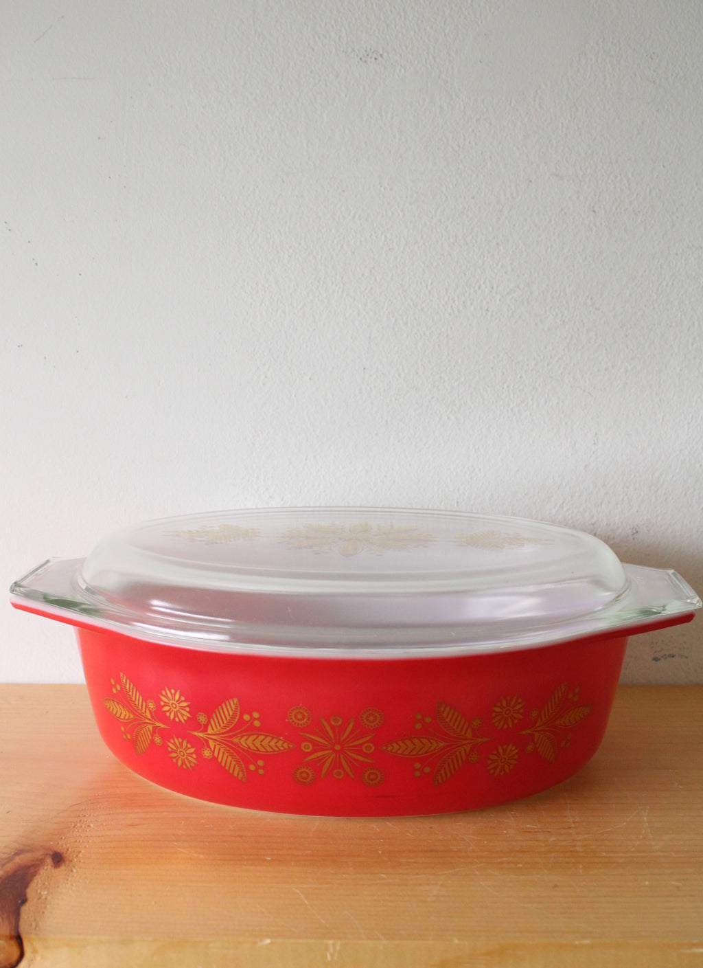 Pyrex 1961 Golden Poinsettia Covered Oval Red Painted Dish