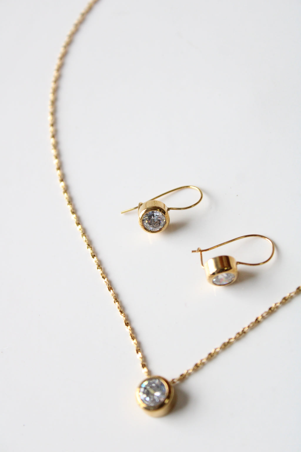 Avon Bezel Set Cubic Zirconia Gold Tone Necklace & Earring Set
