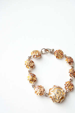 Orange & Silver Swirl Charmed Bracelet