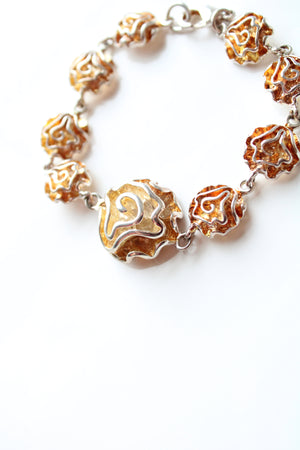 Orange & Silver Swirl Charmed Bracelet