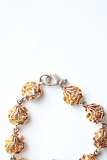 Orange & Silver Swirl Charmed Bracelet