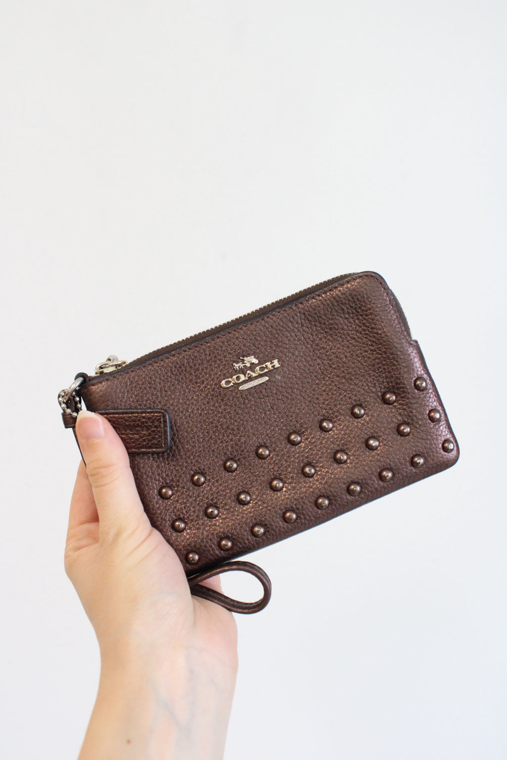 Coach Bronze Studded Wristlet