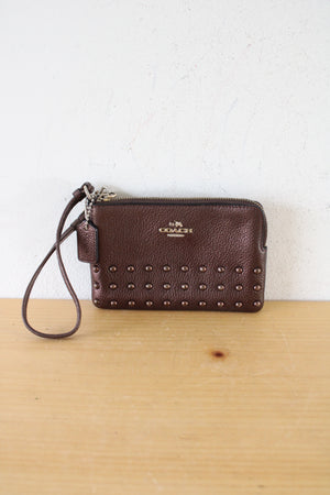 Coach Bronze Studded Wristlet