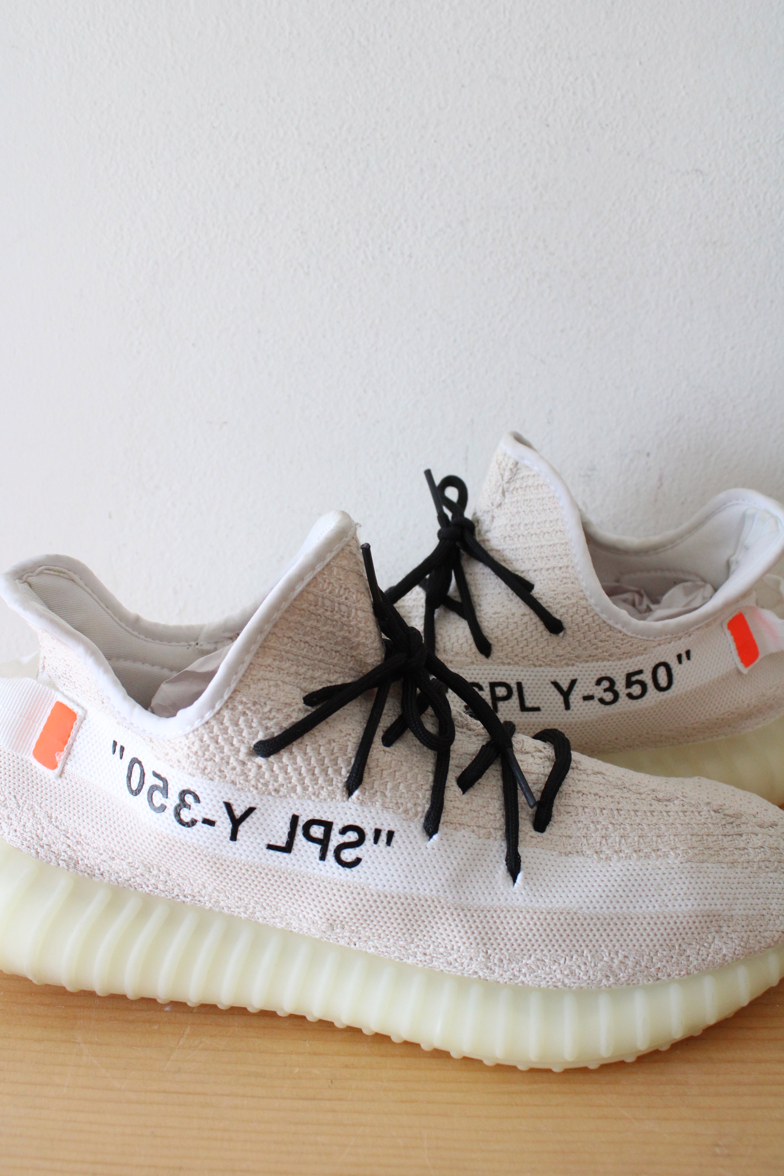 Adidas yeezy x off white price jamaica hotsell