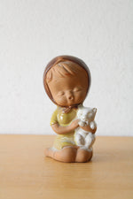 Ceramic Girl Holding Kitten Figurine