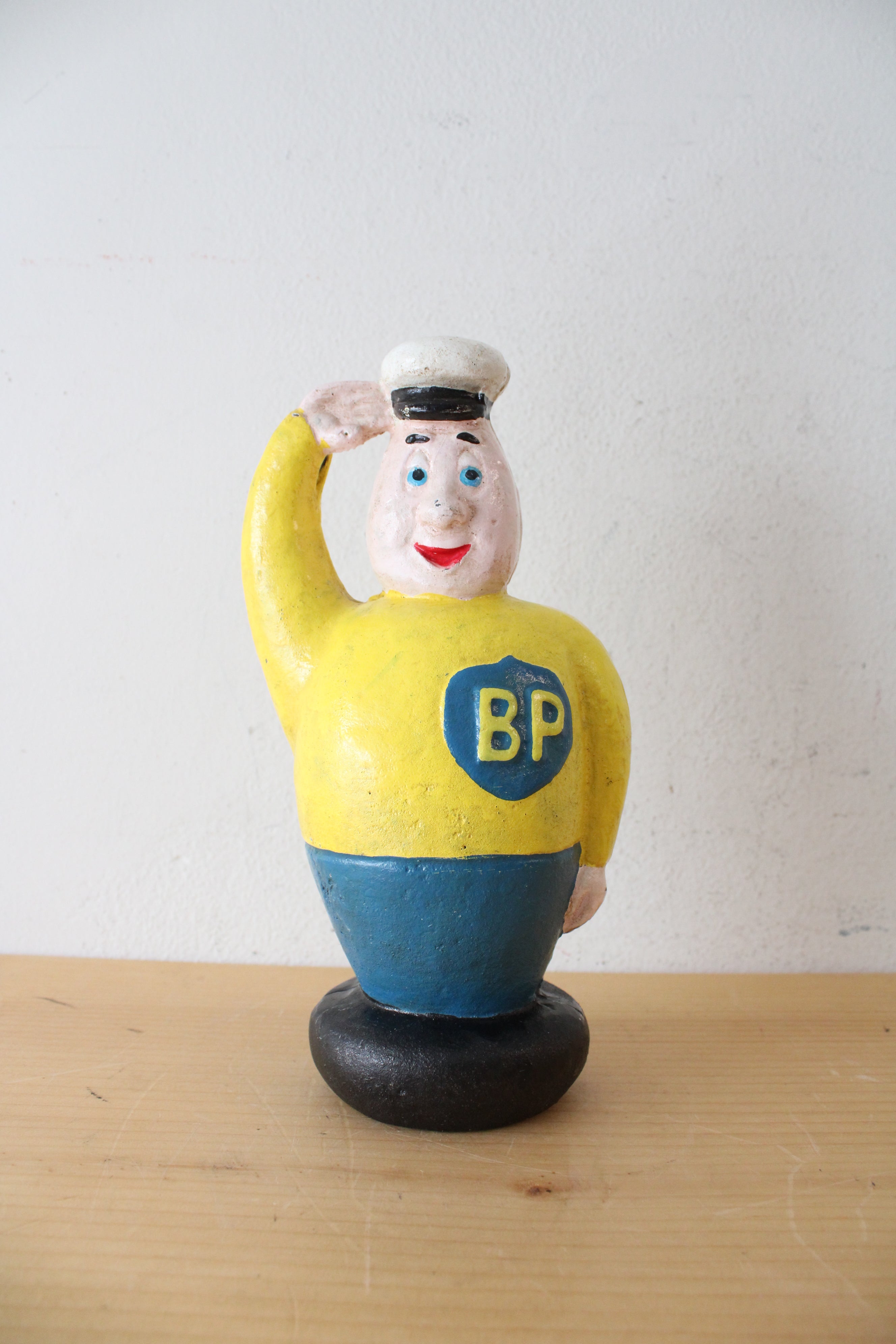 Vintage BP Saluting Man Cast Iron Coin Bank