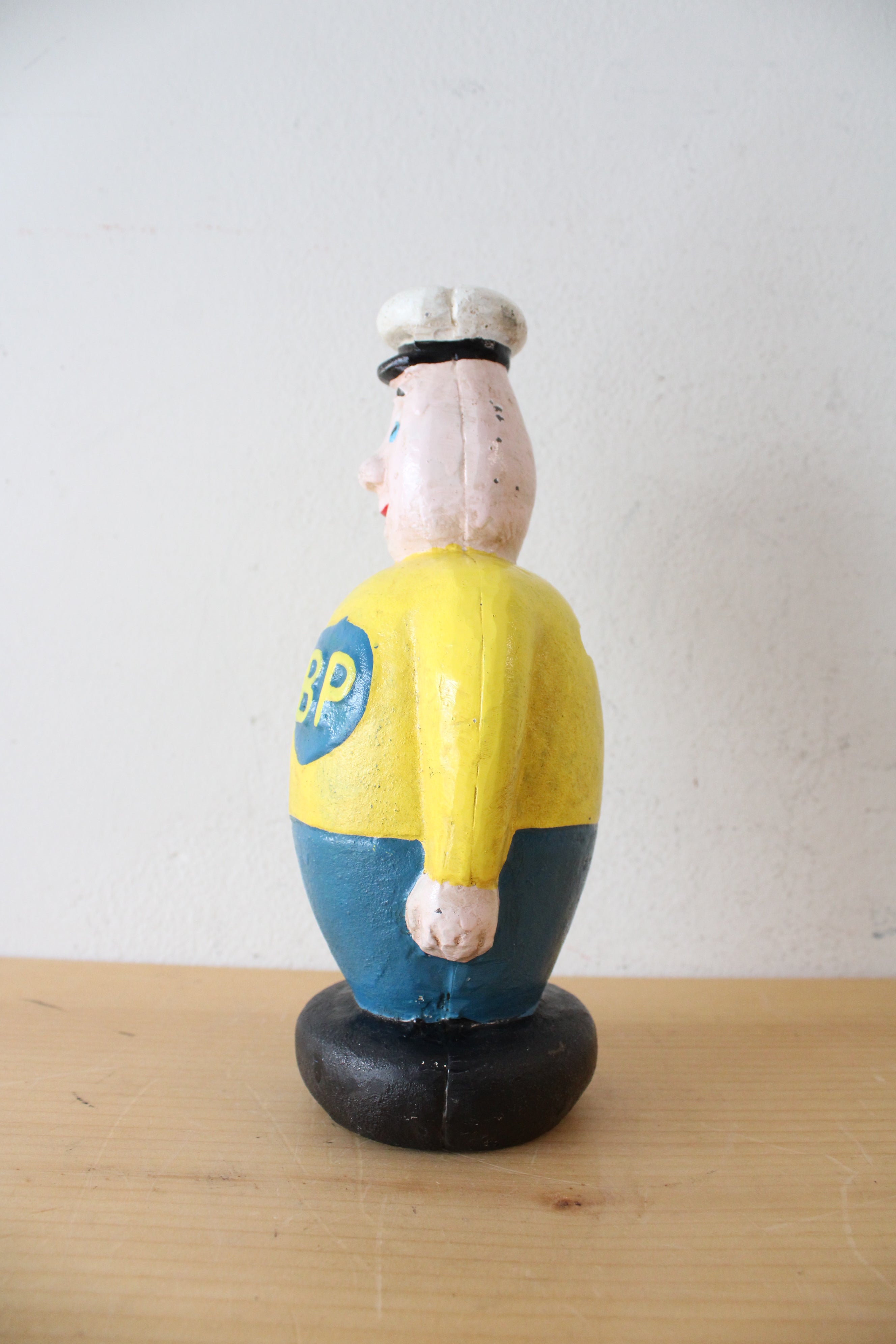 Vintage BP Saluting Man Cast Iron Coin Bank