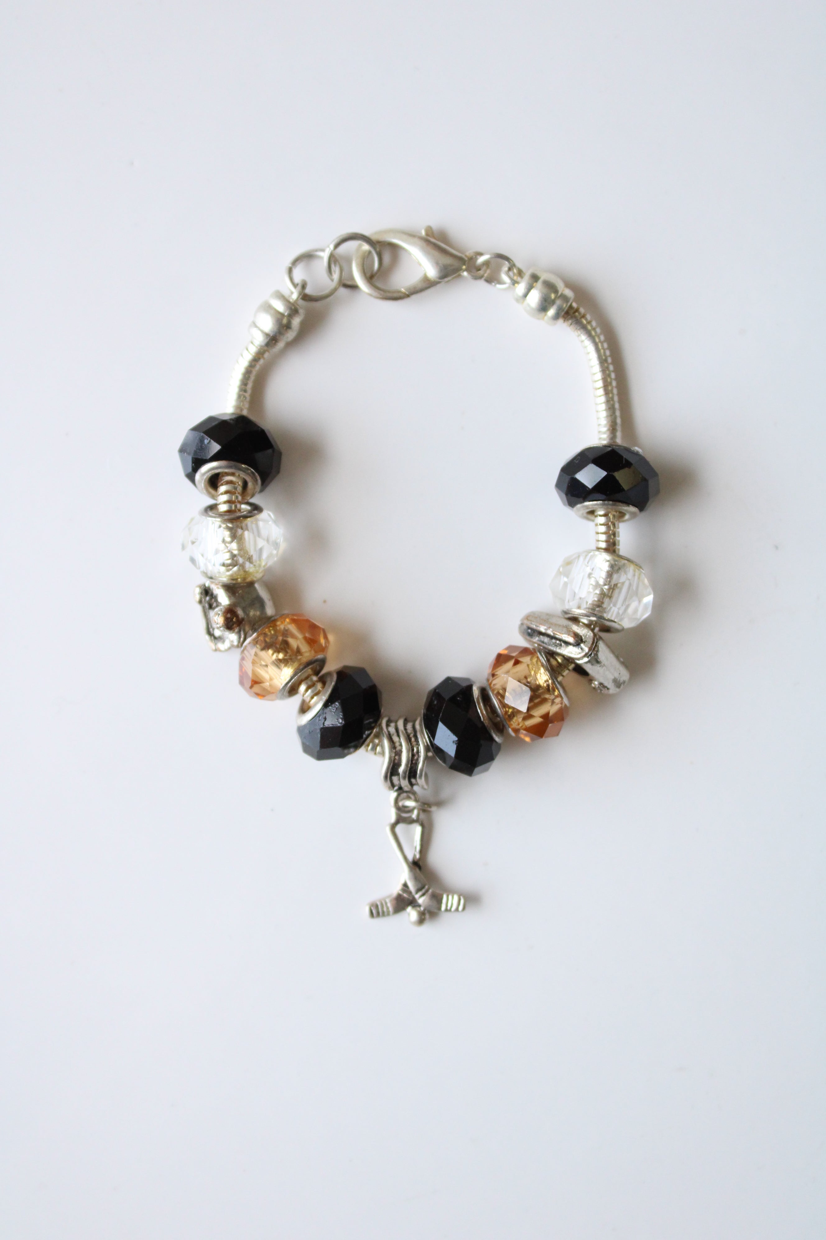 Black & Champagne Glass Beads & Hockey Charms Silver Bracelet