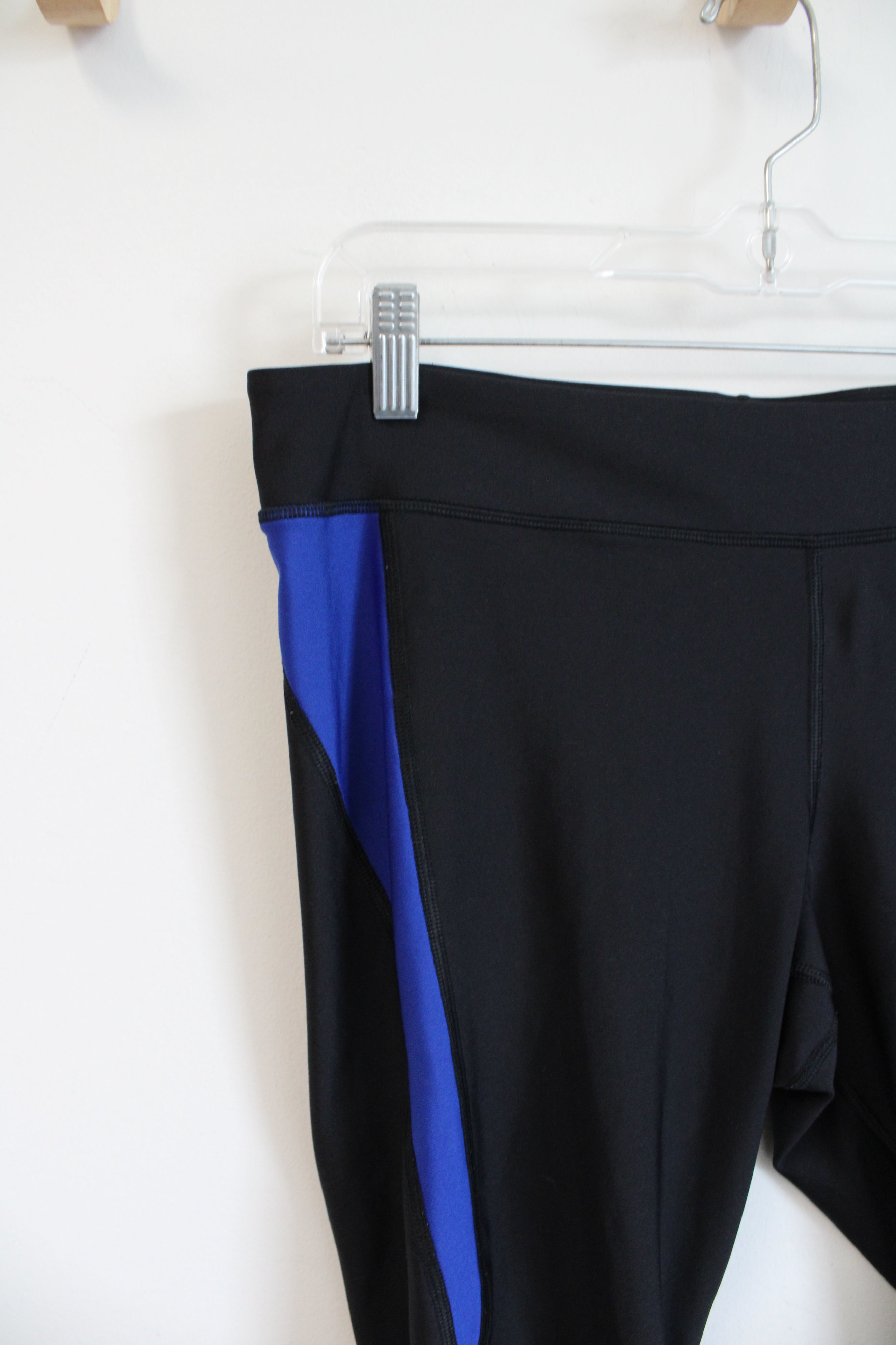 Under Armour Black and Blue Exercise Leggings | M