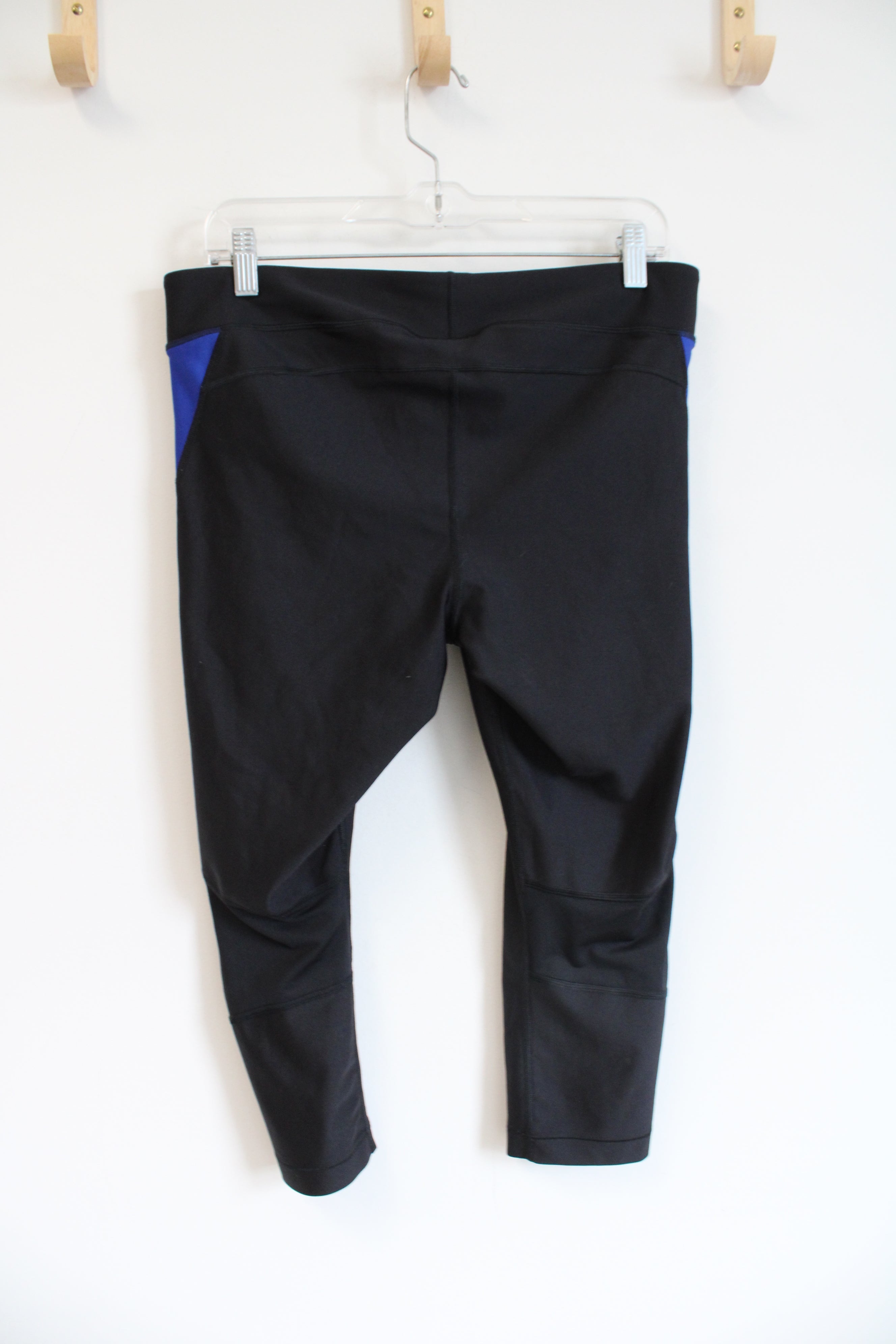 Under Armour Black and Blue Exercise Leggings | M