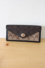 Coach Slim Brown Monogram Kisslock Wallet