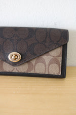 Coach Slim Brown Monogram Kisslock Wallet