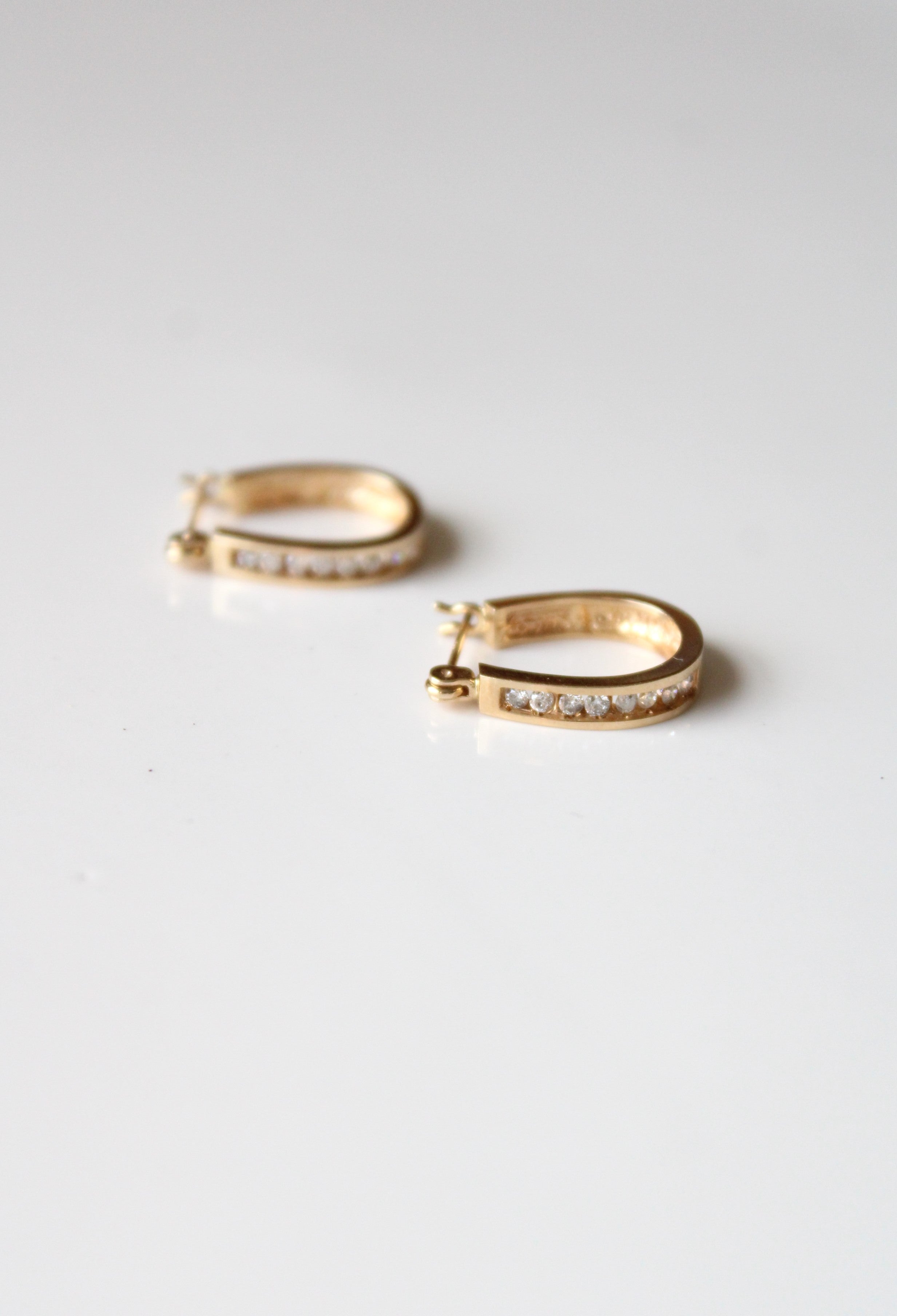 14K Yellow Gold Crystal Inset Oval Hoop Earrings