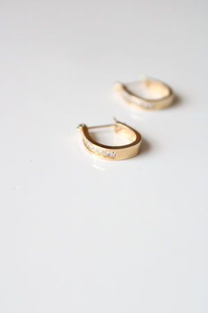 14K Yellow Gold Crystal Inset Oval Hoop Earrings