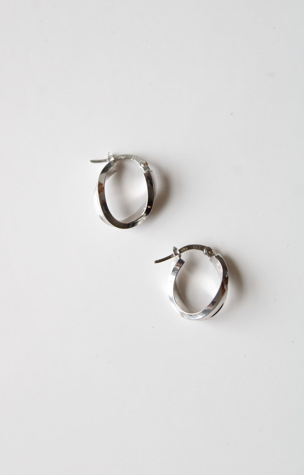 14KT White Gold Twist Oval Hoop Earrings