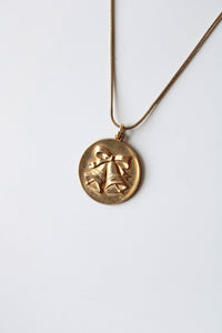 Bells & Bow Engraved Round Pendant Gold Necklace