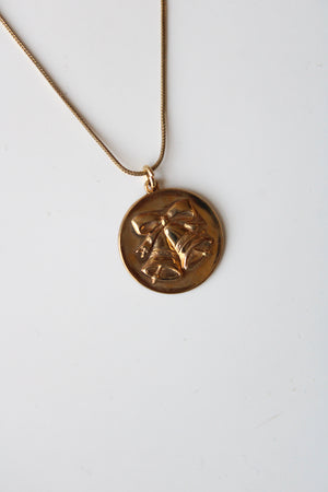 Bells & Bow Engraved Round Pendant Gold Necklace