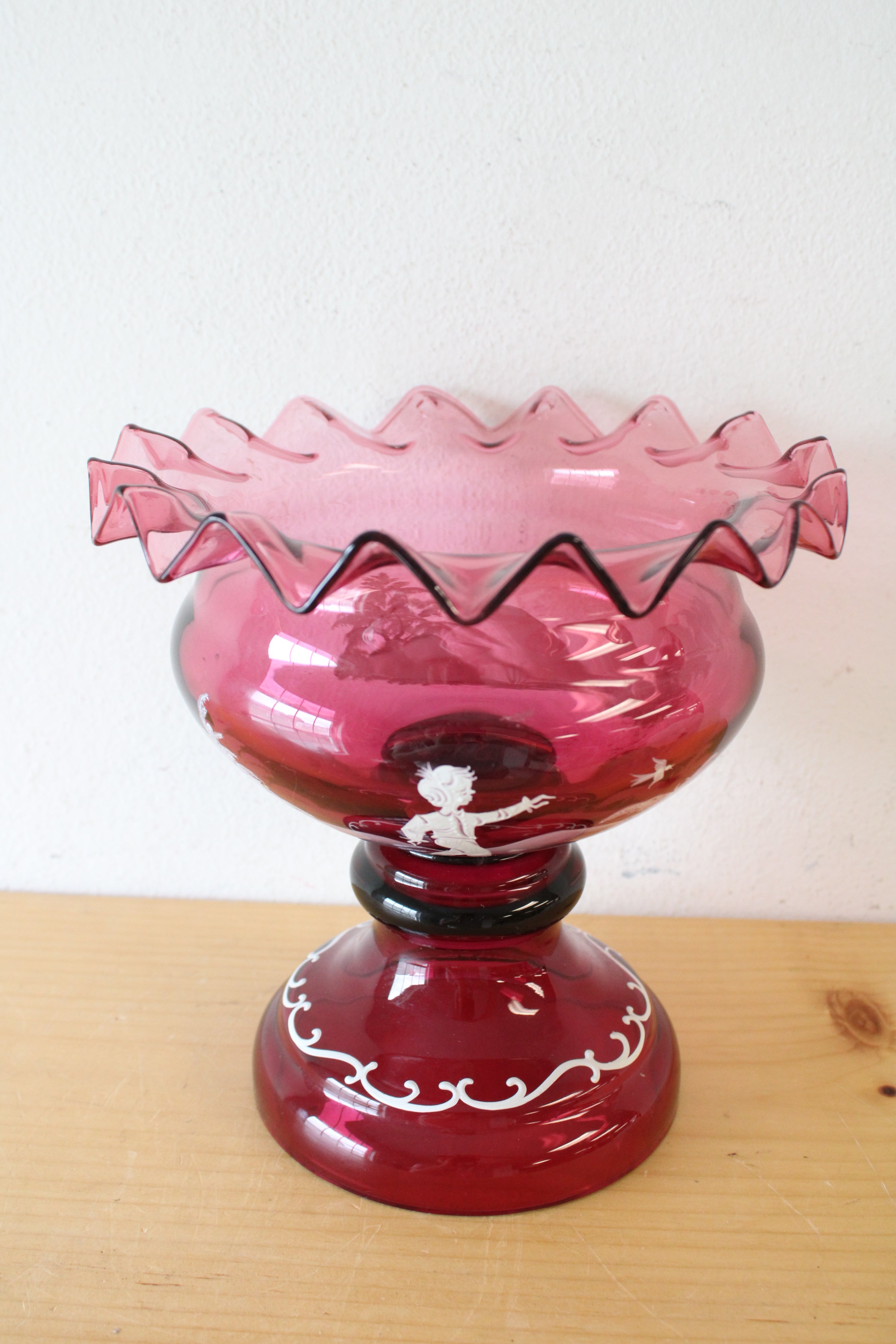 Mary Gregory Hand Painted Ruffled Edged Cranberry Glass Pedestal Vase